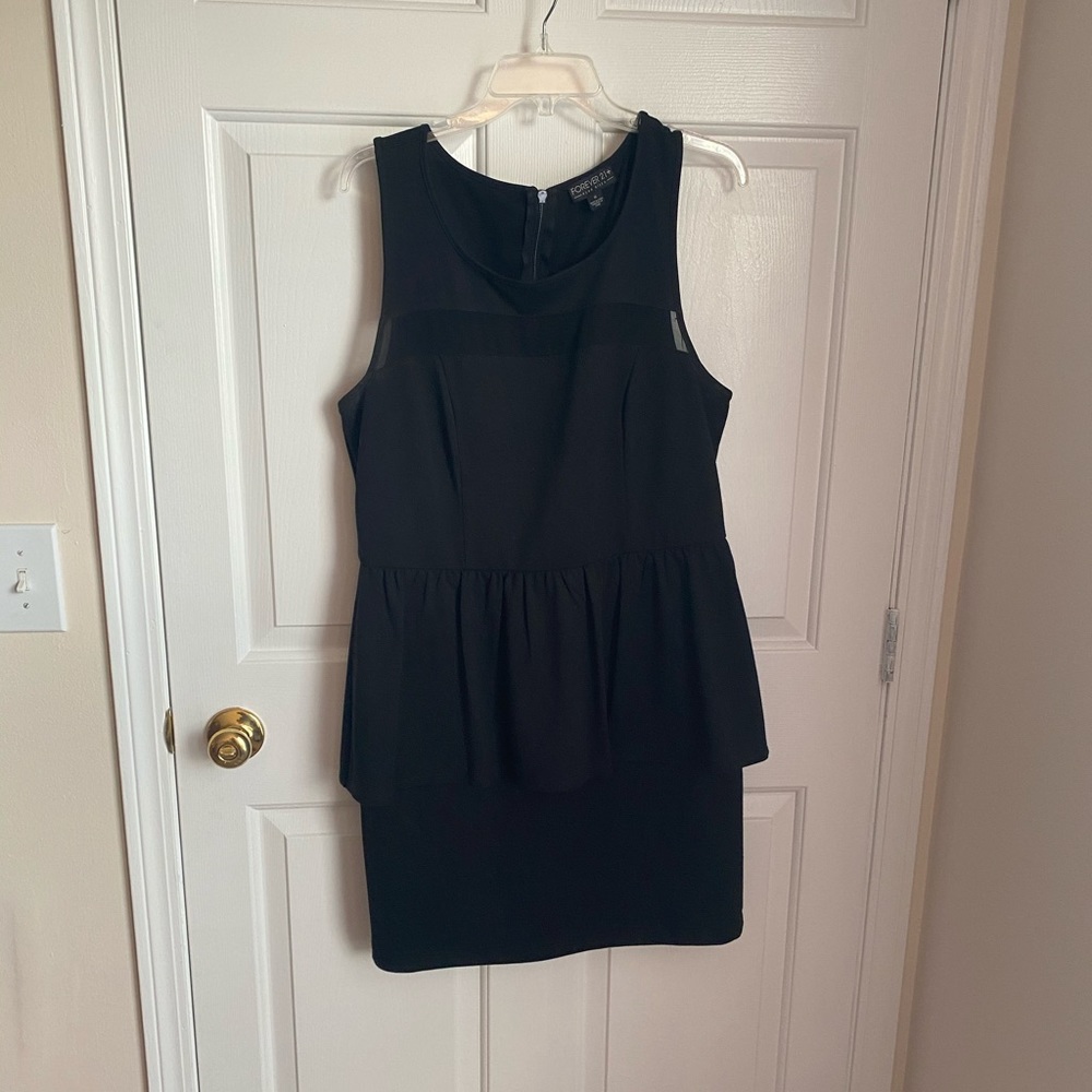 Black peplum dress with mesh